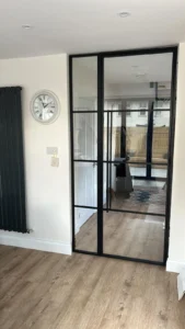 Steel single door with left side panel and transom bars