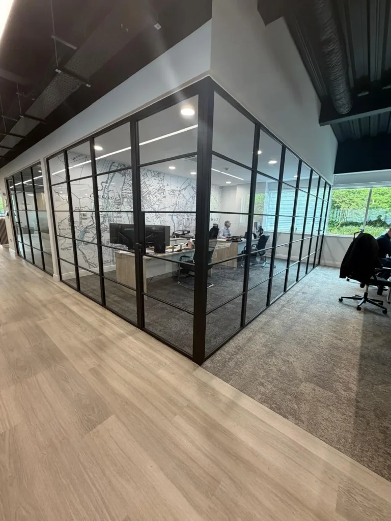 corner black premium frames steel glass office partition creating enclosed workspace UK